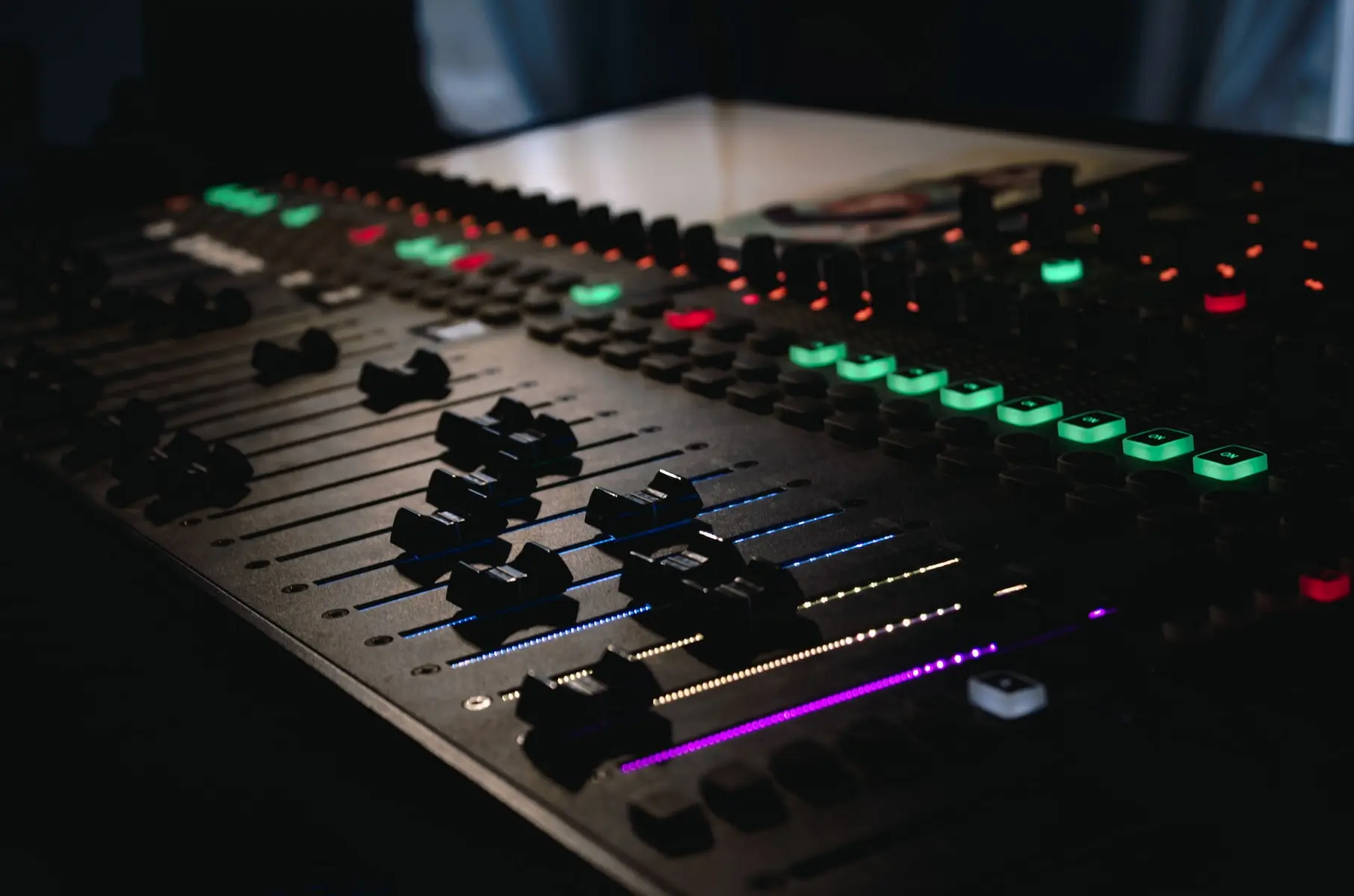 black and green audio mixer